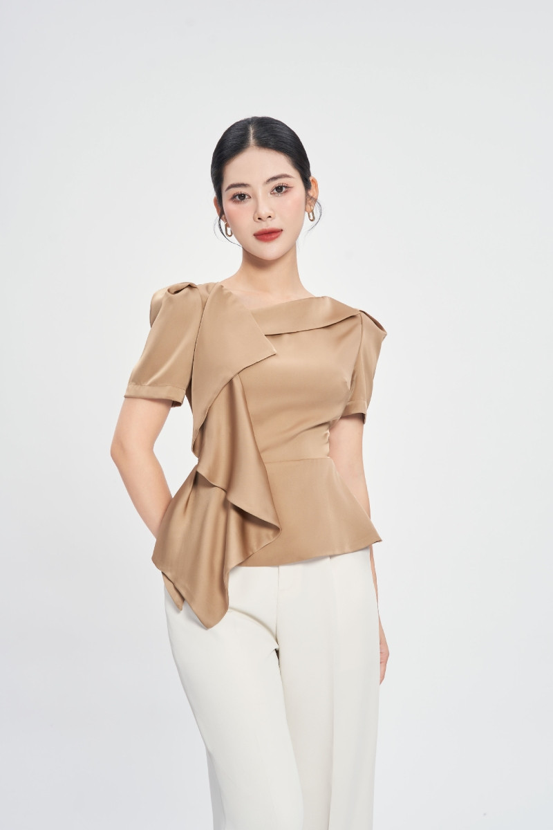 Áo peplum là gì? Hướng dẫn cách phối đồ với váy, áo dáng peplum